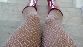 Monique in red hooker boots with rubber dolls