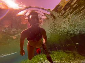 Carissa freediving at the springs--deeper and deeper