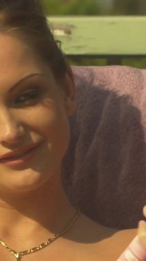 Memorable moment from "Sunbathing is the cause why these two aroused lesbians are fucking on the sunbeds"