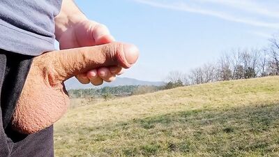 Big dick cum twice in the middle of huge meadow, anybody could watch me