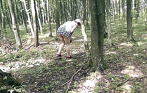 no panties . naked mommy milf without panties picks mushrooms in forest . outdoors outside