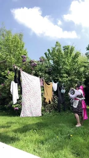 In gardening attire for a day and to hang the laundry.