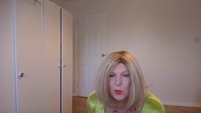 Taking my green dress off in black pantyhose and heels