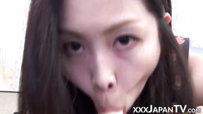 ”Handsome Oriental vixen stuffs mouth with plastic cock”