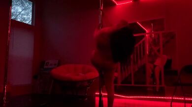 Naughty fitness model strips during pole routine caught on cam