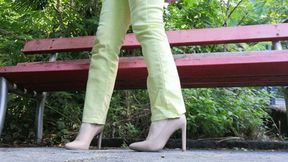 Raven: toe tapping crossed legs, high hells and green jeans outdoor