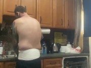 Diaper slave boy doing dishes for master with butt plug in