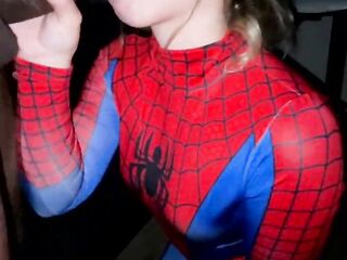 Golden-haired playgirl clothed in spiderwoman dress gets banged by ebony schlong