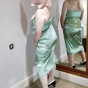 Hot crossdresser in green satin dress