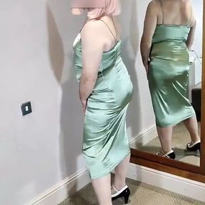 Hot crossdresser in green satin dress