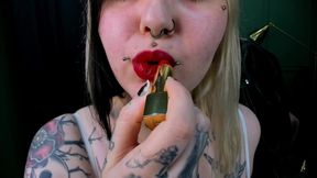 Putting a red lipstick and ruin it