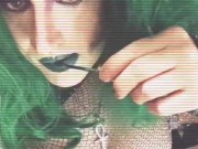 Spooky Drag Queen: Goth girlwith bonus parts applies liquid lip stain