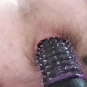 Anal sex vibrator with a spike