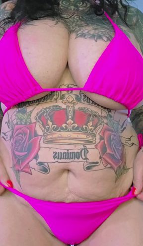 Tattooed woman in bikini
