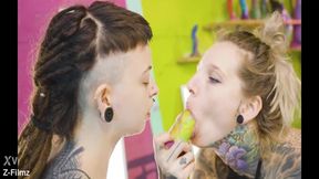 Heavily tattooed alt babe dominates nervous shy GF's pussy in lesbian action