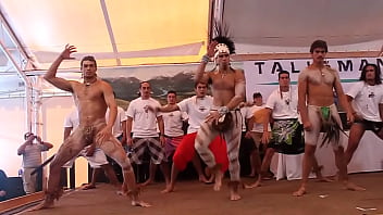 Nearly naked warrior dance