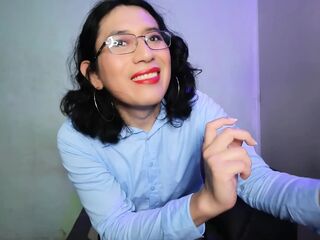 With 2 dildos in his throat.