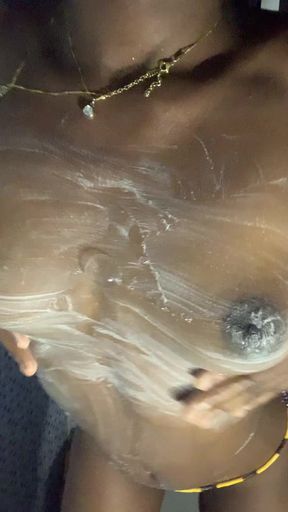 HOT ebony teen enjoys touching her boobs