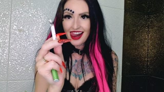 Cigarette smoke. Smoking fetish. Sexy smoking Dominatrix