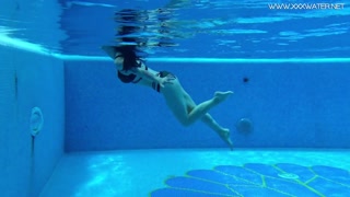 Sexy babes with big tits swim underwater in the pool