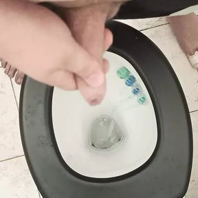 Small handjob in toilet plus cumshot