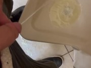 Urinal pissing public restroom
