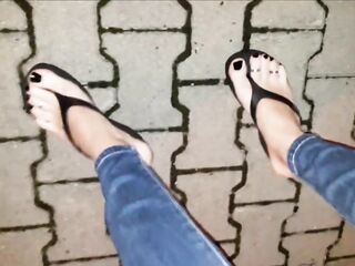 hot crossdresser shows off her astounding feet in platform flip flops on a night walk