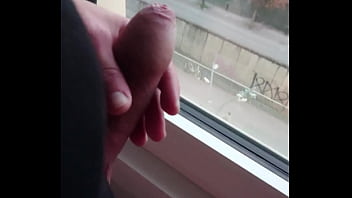 Jerk off at the hotel window