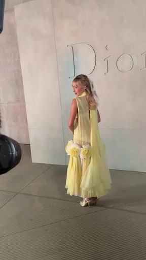 Blonde girl in yellow dress