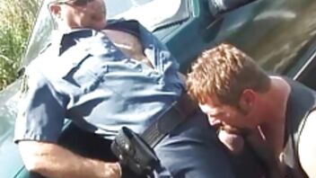 Horny policeman is fucking another gay hard outdoors