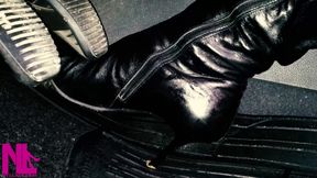 Revving and stamping banana in black leather boots