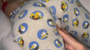 Stepmom was lying reading a book and helped to cum on her hot elastic ass