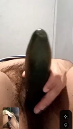 Girl with hairy pussy puts cucumber in the middle of a video call