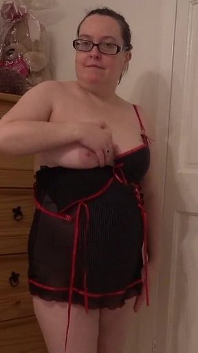 Striptease in Blank Pink Bodice Playing with Breasts
