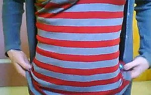 Cute teen ts does a little softcore posing for the cam