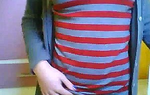 Cute teen ts does a little softcore posing for the cam