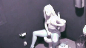 Hot blonde on a toilet