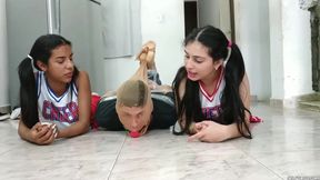 Football Player Pantyhosed and Hogtied on the Floor by Two Cheerleaders!