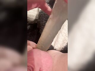 Trans woman banging herself with a vibrator