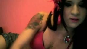 Brunette shemale demonstrates her awesome butt for the webcam