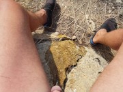 Pisciata sulla scogliera vista mare
