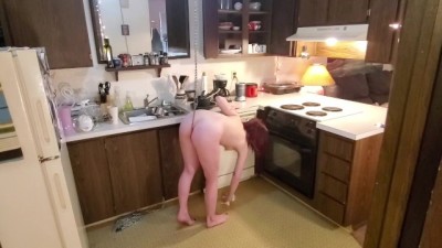 slavegirl cleans kitchen in chains and anal hook