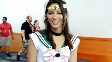Cosplay girl flashes herself in full costume at crowded convention