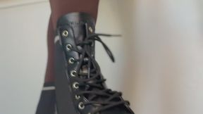 Big foot in black boots long legs Ebony Giantess food crushing