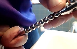 Another pee this time with my toy inside my penis