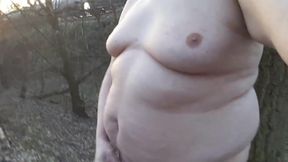 Chubby masturbates in the woods