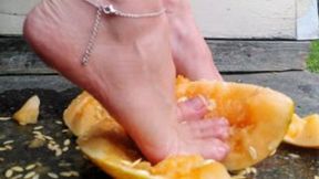 Feet and toes crushing melon delight