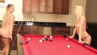 Adorable Baby Dyke showing natural breasts while having fun billiard