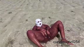 African beach hottie with massive rear shows off her twerking moves while