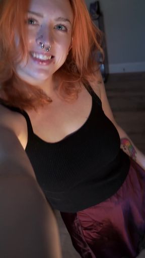 Amateur with big tits tries on a chastity belt for her fans